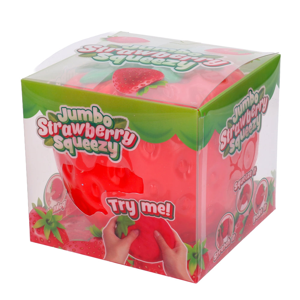 Squishy aardbei in de hand, voor schaal